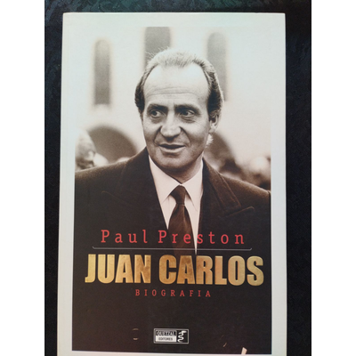 Capa de livro biografia de Juan Carlos com foto a preto e branco e texto em destaque