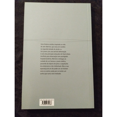 Parte de trás de um livro verde claro com texto e código de barras