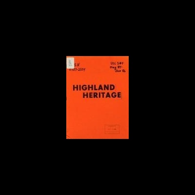 Capa de livro laranja com texto Preto HIGHLAND HERITAGE e anotações manuscritas