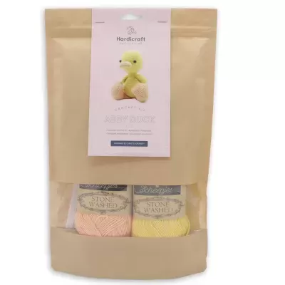 Conjunto de fios Stone Washed em embalagem bege com etiqueta de pato de tricot