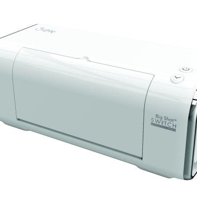 Aparelho branco com texto Big Shot SWITCH na lateral