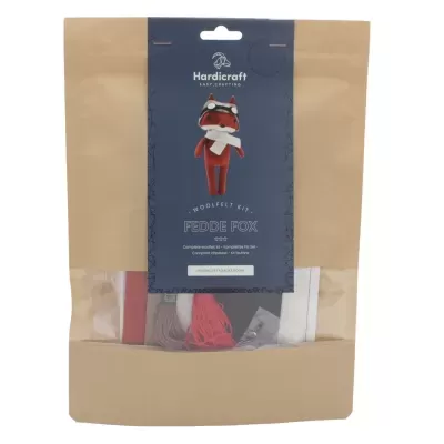 Kit de tricotado de raposa vermelho, branco e cinzento na embalagem de papel