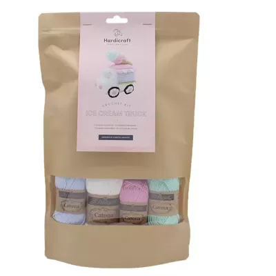 Pacote de material para artesanato com novelos de lã colorida e etiqueta rosa