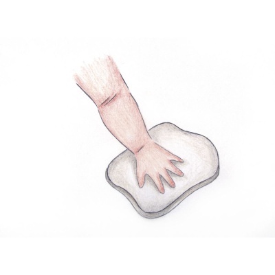 Desenho de mão a pressionar almofada branca