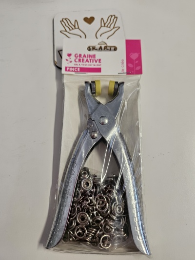 Eina metàl·lica platejada amb peces petites en embalatge de plàstic amb etiqueta GRAINE CREATIVE