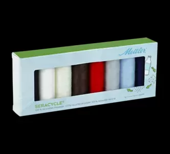 Conjunto de seis fraldas coloridas embaladas em caixa branca com janela transparente