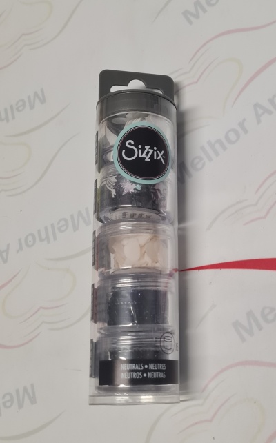 embalagem transparente com três recipientes empilhados da marca Sizzix, texto neutros em várias línguas