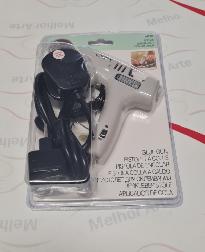Pistola de cola quente branca com cabo e carregador em embalagem transparente