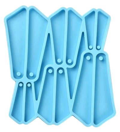 Conjunto de moldes de silicone azul claro com formas geométricas e buracos circulares