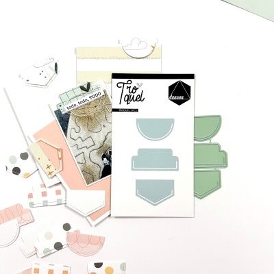 Moldes de corte e peças de papel colorido com padrões geométricos