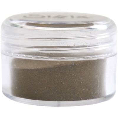 Frasco pequeno transparente com pó castanho escuro