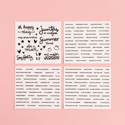 Dois papéis com palavras e desenhos em caligrafia preta sobre fundo branco