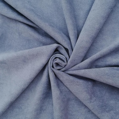 Tecido azul cinzento aveludado com pregas circulares