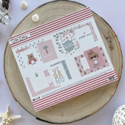 Conjunto de papelaria colorida com ilustrações e texto, sobre base de madeira redonda