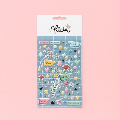Pacote de autocolantes Alicia com desenhos coloridos sobre fundo quadriculado azul.