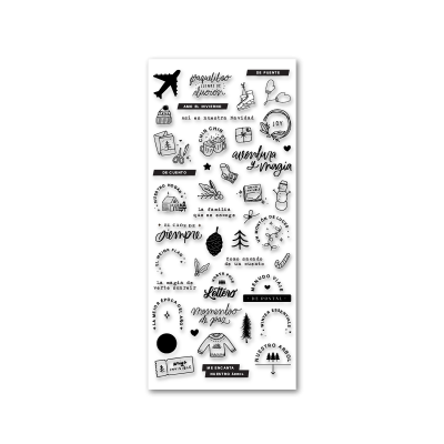 Folha branca com autocolantes pretos com desenhos e frases em espanhol sobre viagem e família