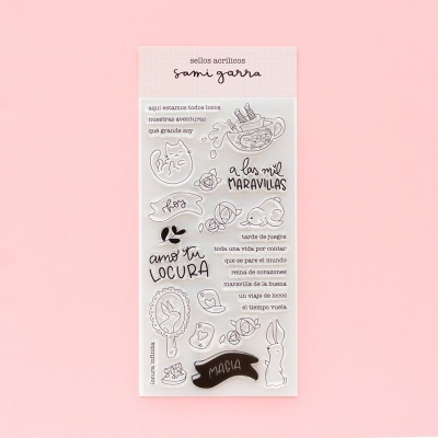 Conjunto de selos acrílicos com ilustrações e textos em espanhol, fundo rosa