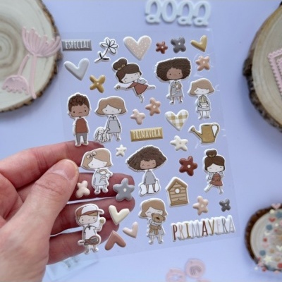 Folha com autocolantes em relevo de crianças, corações e flores em tons pastel e castanho