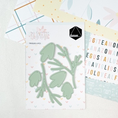 Peças de metal verde em forma de folhas com embalagem da marca Dunaon