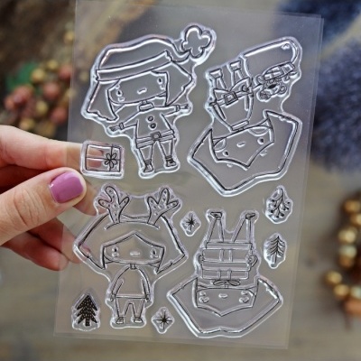 Folha de carimbos de bonecos e elementos natalícios transparentes