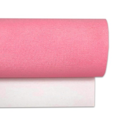 Rolo de tecido rosa e branco com textura lisa
