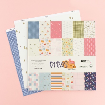 Blocos de papel de scrapbook com padrões coloridos em vários tons