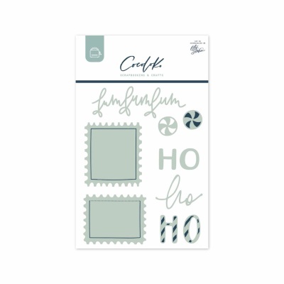 Autocolantes decorativos verde pastel, azul e branco com palavras e formas em cartão branco.