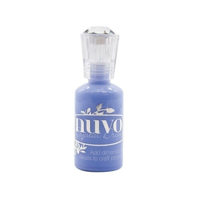 Frasco de tinta Nuvo Crystal Drops azul com tampa transparente e rótulo branco.
