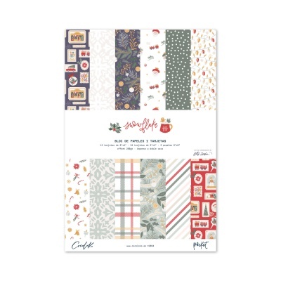 Bloco de papéis e tarjetas com várias estampas natalícias coloridas, embalagem branca com texto