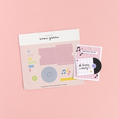 Conjunto de papelaria temática musical com discos de vinil e notas musicais em papel texturizado rosa