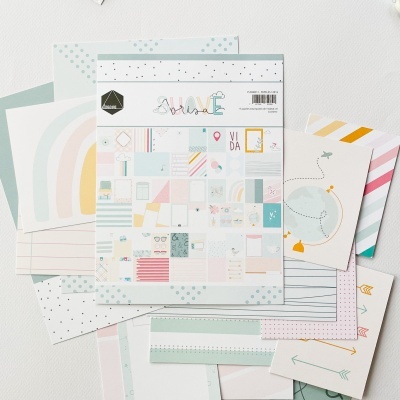 Folhas decorativas de papel com padrões e cores pastel