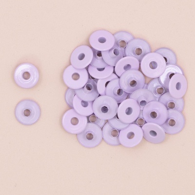 Conjunto de contas redondas roxas com furo no centro