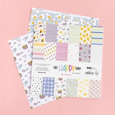 Conjunto de papeis decorativos para scrapbook com padrões variados e coloridos em fundo rosa