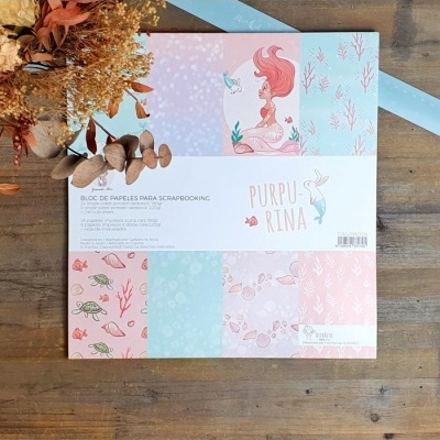 Bloco de papéis para scrapbooking com desenhos marinhos e figura feminina em tons pastel
