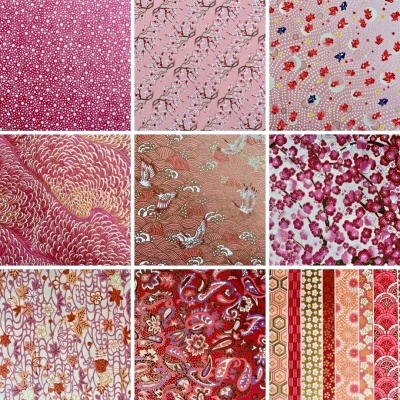 Padrões diversos de tecidos em tons rosa e vermelho com motivos florais e geométricos