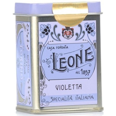 Lata metálica lilás Leone Violetta com padrão floral e texto italiano