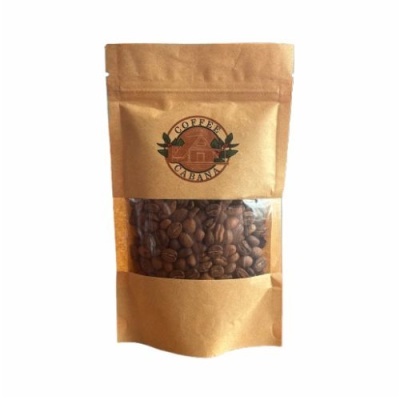 Sacochete de papel castanho com grãos de café visíveis e logótipo COFFEE GRANA