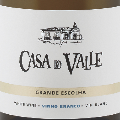 Rótulo de vinho branco Casa do Valle com ilustração de casa e texto em inglês, português e francês
