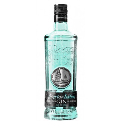 Garrafa de gin Porto de Indias azul com rótulo preto e selo prateado