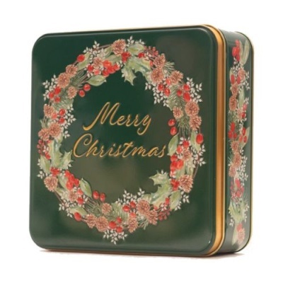 Caixa metálica verde escura com coroa de Natal e texto Merry Christmas