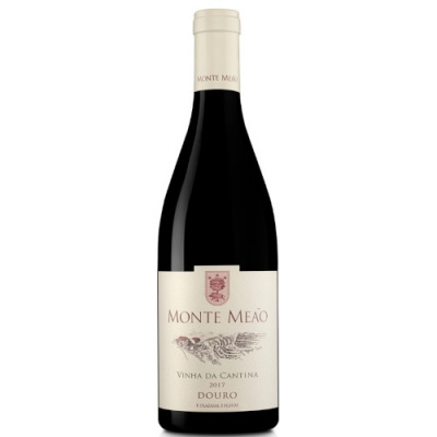 Garrafa de vinho tinto Monte Meão com rótulo creme e texto em vermelho e preto