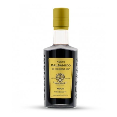 Garrafa de vidro escuro com tampa e rótulo amarelo de Aceto Balsamico di Modena