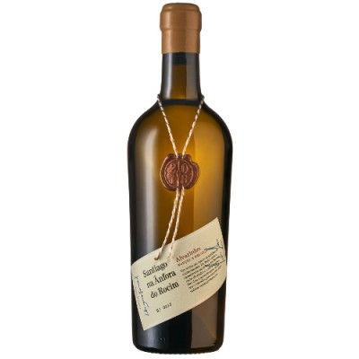 Garrafa de vidro âmbar com etiqueta pendurada e selo de cera no gargalo