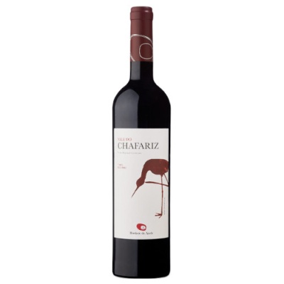 Garrafa de vinho tinto Vale do Chafariz com rótulo branco e pássaro castanho.