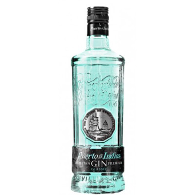 Garrafa de gin Porto de Indias azul com rótulo preto e selo prateado