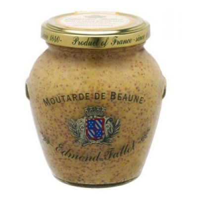Frasco de mostarda granulada amarela e castanha com tampa dourada e rótulo com brasão.