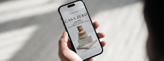 Telemóvel a mostrar imagem de pincel e blocos de cerâmica com texto CASA ZERO