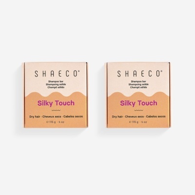 Duas embalagens de champô sólido SHAECO Silky Touch para cabelos secos