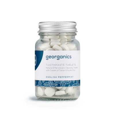 Frasco de vidro com pastilhas de creme dental georganics