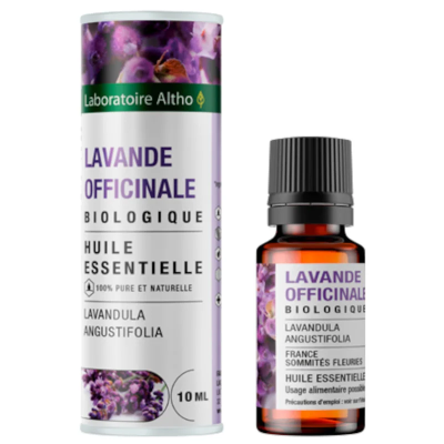 Frasco de óleo essencial de lavanda com embalagem cilíndrica roxa e branca.